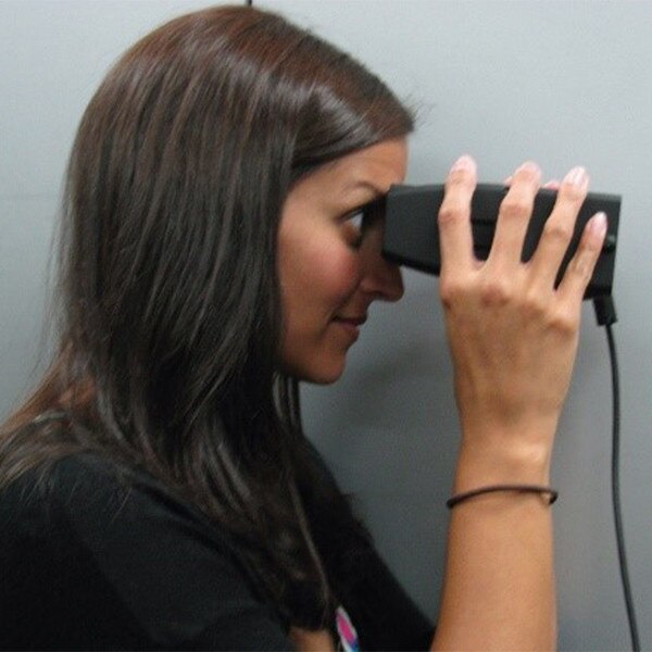 woman using iris scanner